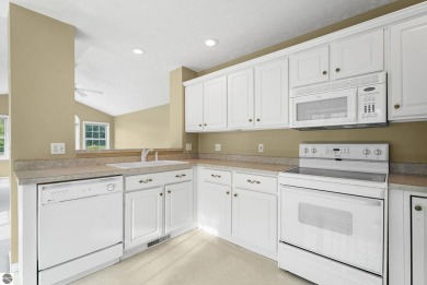 Enjoy low-maintenance living with beautiful golf course views in on Crown Golf Course in Michigan - for sale on GolfHomes.com, golf home, golf lot