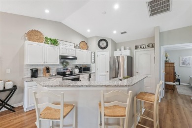 Under contract-accepting backup offers. This beautifully updated on Tampa Bay Golf and Country Club in Florida - for sale on GolfHomes.com, golf home, golf lot