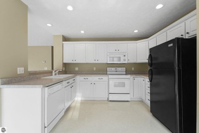 Enjoy low-maintenance living with beautiful golf course views in on Crown Golf Course in Michigan - for sale on GolfHomes.com, golf home, golf lot