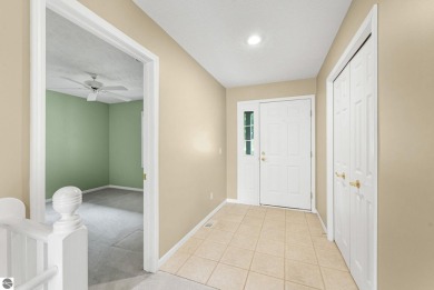 Enjoy low-maintenance living with beautiful golf course views in on Crown Golf Course in Michigan - for sale on GolfHomes.com, golf home, golf lot