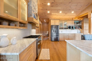 This Luxury Upscale Custom Lakefront Log  Stone Home invites you on Tellico Village -The Links At Kahite Golf Course in Tennessee - for sale on GolfHomes.com, golf home, golf lot