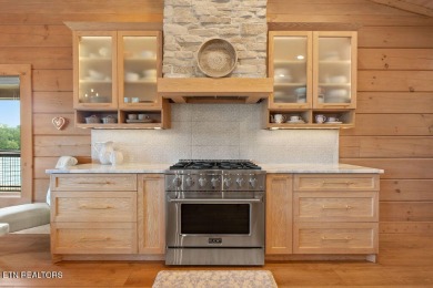 This Luxury Upscale Custom Lakefront Log  Stone Home invites you on Tellico Village -The Links At Kahite Golf Course in Tennessee - for sale on GolfHomes.com, golf home, golf lot