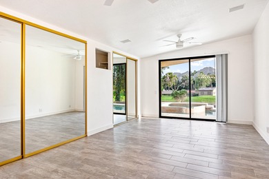 Step inside your own private, gated courtyard and prepare to be on Palm Desert Country Club in California - for sale on GolfHomes.com, golf home, golf lot