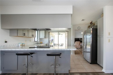 Welcome to this stunning Islander model nestled in the highly on Sandpiper Golf Club in Florida - for sale on GolfHomes.com, golf home, golf lot