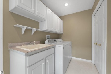 Enjoy low-maintenance living with beautiful golf course views in on Crown Golf Course in Michigan - for sale on GolfHomes.com, golf home, golf lot