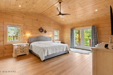 This Luxury Upscale Custom Lakefront Log  Stone Home invites you on Tellico Village -The Links At Kahite Golf Course in Tennessee - for sale on GolfHomes.com, golf home, golf lot