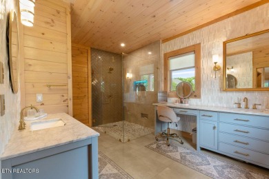 This Luxury Upscale Custom Lakefront Log  Stone Home invites you on Tellico Village -The Links At Kahite Golf Course in Tennessee - for sale on GolfHomes.com, golf home, golf lot