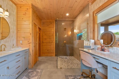 This Luxury Upscale Custom Lakefront Log  Stone Home invites you on Tellico Village -The Links At Kahite Golf Course in Tennessee - for sale on GolfHomes.com, golf home, golf lot