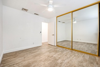 Step inside your own private, gated courtyard and prepare to be on Palm Desert Country Club in California - for sale on GolfHomes.com, golf home, golf lot