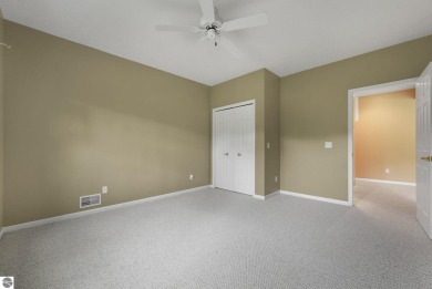 Enjoy low-maintenance living with beautiful golf course views in on Crown Golf Course in Michigan - for sale on GolfHomes.com, golf home, golf lot