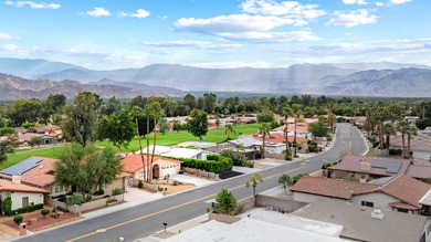 Step inside your own private, gated courtyard and prepare to be on Palm Desert Country Club in California - for sale on GolfHomes.com, golf home, golf lot