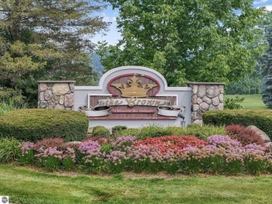 Enjoy low-maintenance living with beautiful golf course views in on Crown Golf Course in Michigan - for sale on GolfHomes.com, golf home, golf lot