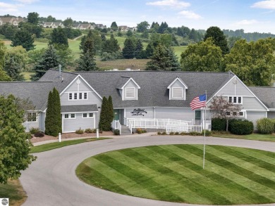 Enjoy low-maintenance living with beautiful golf course views in on Crown Golf Course in Michigan - for sale on GolfHomes.com, golf home, golf lot