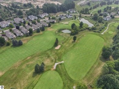 Enjoy low-maintenance living with beautiful golf course views in on Crown Golf Course in Michigan - for sale on GolfHomes.com, golf home, golf lot