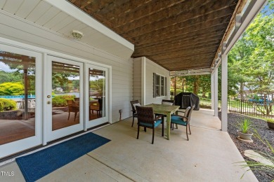 Discover exceptional Waterfront living in this stunning on River Golf and County Club at Lake Royale in North Carolina - for sale on GolfHomes.com, golf home, golf lot