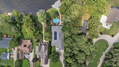 Discover exceptional Waterfront living in this stunning on River Golf and County Club at Lake Royale in North Carolina - for sale on GolfHomes.com, golf home, golf lot