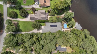 Discover exceptional Waterfront living in this stunning on River Golf and County Club at Lake Royale in North Carolina - for sale on GolfHomes.com, golf home, golf lot