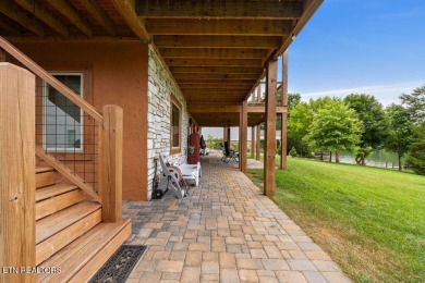 This Luxury Upscale Custom Lakefront Log  Stone Home invites you on Tellico Village -The Links At Kahite Golf Course in Tennessee - for sale on GolfHomes.com, golf home, golf lot
