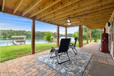 This Luxury Upscale Custom Lakefront Log  Stone Home invites you on Tellico Village -The Links At Kahite Golf Course in Tennessee - for sale on GolfHomes.com, golf home, golf lot
