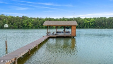 This Luxury Upscale Custom Lakefront Log  Stone Home invites you on Tellico Village -The Links At Kahite Golf Course in Tennessee - for sale on GolfHomes.com, golf home, golf lot