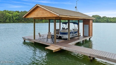 This Luxury Upscale Custom Lakefront Log  Stone Home invites you on Tellico Village -The Links At Kahite Golf Course in Tennessee - for sale on GolfHomes.com, golf home, golf lot
