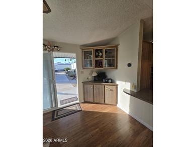 This rare 2bedroom, 2bathroom home offers a spacious living room on Great Eagle Golf Club in Arizona - for sale on GolfHomes.com, golf home, golf lot