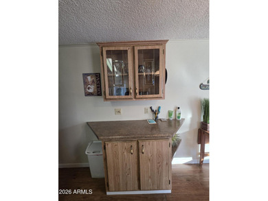 This rare 2bedroom, 2bathroom home offers a spacious living room on Great Eagle Golf Club in Arizona - for sale on GolfHomes.com, golf home, golf lot