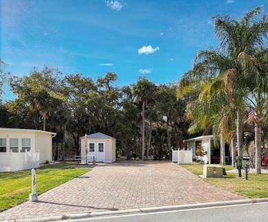 This very nice RV site features a 21'x83' RV pad with concrete on The Great Outdoors Golf and Country Club in Florida - for sale on GolfHomes.com, golf home, golf lot
