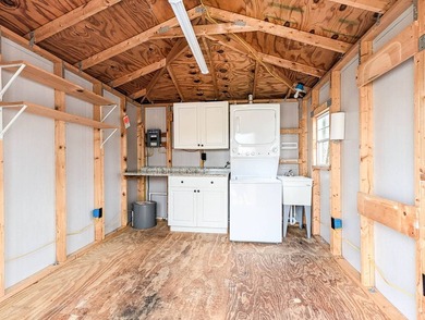 This very nice RV site features a 21'x83' RV pad with concrete on The Great Outdoors Golf and Country Club in Florida - for sale on GolfHomes.com, golf home, golf lot