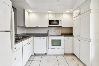 Under contract-accepting backup offers. Welcome to this spacious on Cove Cay Country Club in Florida - for sale on GolfHomes.com, golf home, golf lot