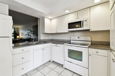 Under contract-accepting backup offers. Welcome to this spacious on Cove Cay Country Club in Florida - for sale on GolfHomes.com, golf home, golf lot