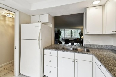 Under contract-accepting backup offers. Welcome to this spacious on Cove Cay Country Club in Florida - for sale on GolfHomes.com, golf home, golf lot