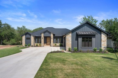 A beautifully designed, custom-built new construction on Ram Rock Golf Course in Texas - for sale on GolfHomes.com, golf home, golf lot