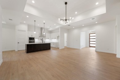 A beautifully designed, custom-built new construction on Ram Rock Golf Course in Texas - for sale on GolfHomes.com, golf home, golf lot