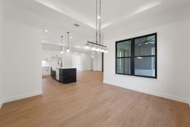 A beautifully designed, custom-built new construction on Ram Rock Golf Course in Texas - for sale on GolfHomes.com, golf home, golf lot