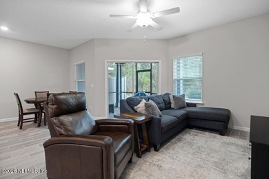 This perfectly maintained, low-maintenance townhome is ready for on Golf Club At South Hampton in Florida - for sale on GolfHomes.com, golf home, golf lot