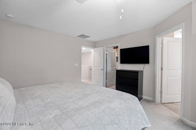 This perfectly maintained, low-maintenance townhome is ready for on Golf Club At South Hampton in Florida - for sale on GolfHomes.com, golf home, golf lot