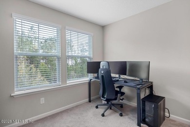 This perfectly maintained, low-maintenance townhome is ready for on Golf Club At South Hampton in Florida - for sale on GolfHomes.com, golf home, golf lot