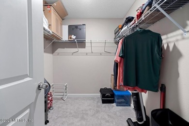 This perfectly maintained, low-maintenance townhome is ready for on Golf Club At South Hampton in Florida - for sale on GolfHomes.com, golf home, golf lot