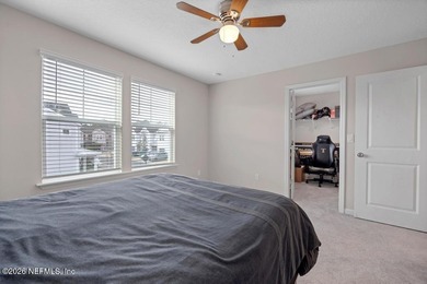 This perfectly maintained, low-maintenance townhome is ready for on Golf Club At South Hampton in Florida - for sale on GolfHomes.com, golf home, golf lot