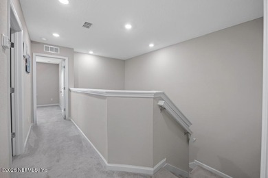 This perfectly maintained, low-maintenance townhome is ready for on Golf Club At South Hampton in Florida - for sale on GolfHomes.com, golf home, golf lot