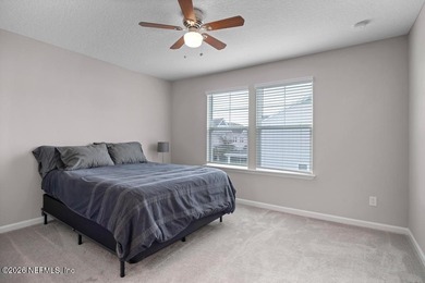 This perfectly maintained, low-maintenance townhome is ready for on Golf Club At South Hampton in Florida - for sale on GolfHomes.com, golf home, golf lot