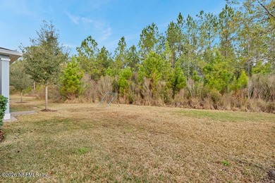 This perfectly maintained, low-maintenance townhome is ready for on Golf Club At South Hampton in Florida - for sale on GolfHomes.com, golf home, golf lot