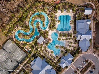 This perfectly maintained, low-maintenance townhome is ready for on Golf Club At South Hampton in Florida - for sale on GolfHomes.com, golf home, golf lot