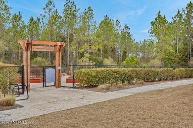 This perfectly maintained, low-maintenance townhome is ready for on Golf Club At South Hampton in Florida - for sale on GolfHomes.com, golf home, golf lot