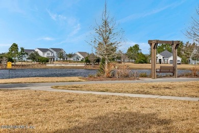 This perfectly maintained, low-maintenance townhome is ready for on Golf Club At South Hampton in Florida - for sale on GolfHomes.com, golf home, golf lot