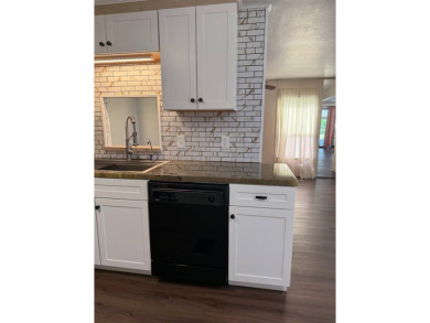 THIS LOVELY, 2/2 MANUFACTURED HOME IS ON LEASED LAND.  MONTHLY on Pine Lakes Country Club in Florida - for sale on GolfHomes.com, golf home, golf lot