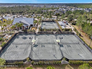 This perfectly maintained, low-maintenance townhome is ready for on Golf Club At South Hampton in Florida - for sale on GolfHomes.com, golf home, golf lot