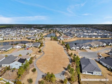 This perfectly maintained, low-maintenance townhome is ready for on Golf Club At South Hampton in Florida - for sale on GolfHomes.com, golf home, golf lot
