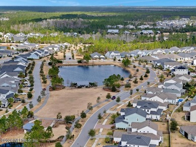 This perfectly maintained, low-maintenance townhome is ready for on Golf Club At South Hampton in Florida - for sale on GolfHomes.com, golf home, golf lot